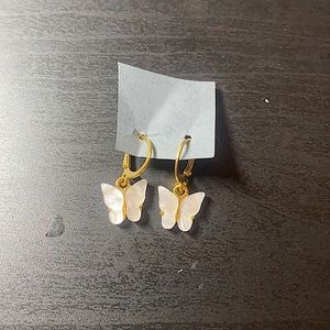 White butterfly gold earrings